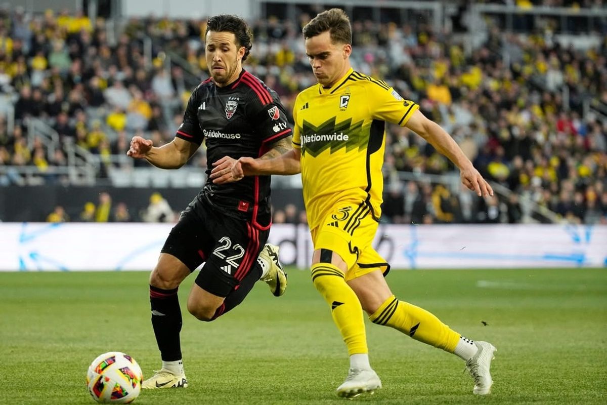 Apr 6, 2024; Columbus, OH, USA; D.C. United defender Aaron Herrera (22) plays the ball defend by Columbus Crew defender Will Sands (3) in the first half at Lower.com Field.
