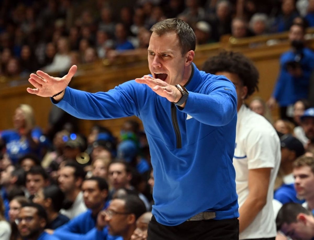 Dec 9, 2023; Durham, North Carolina, USA;  Duke Blue Devils head coach Jon Scheyer reacts to a call during the second half against the Charlotte 49ers at Cameron Indoor Stadium.