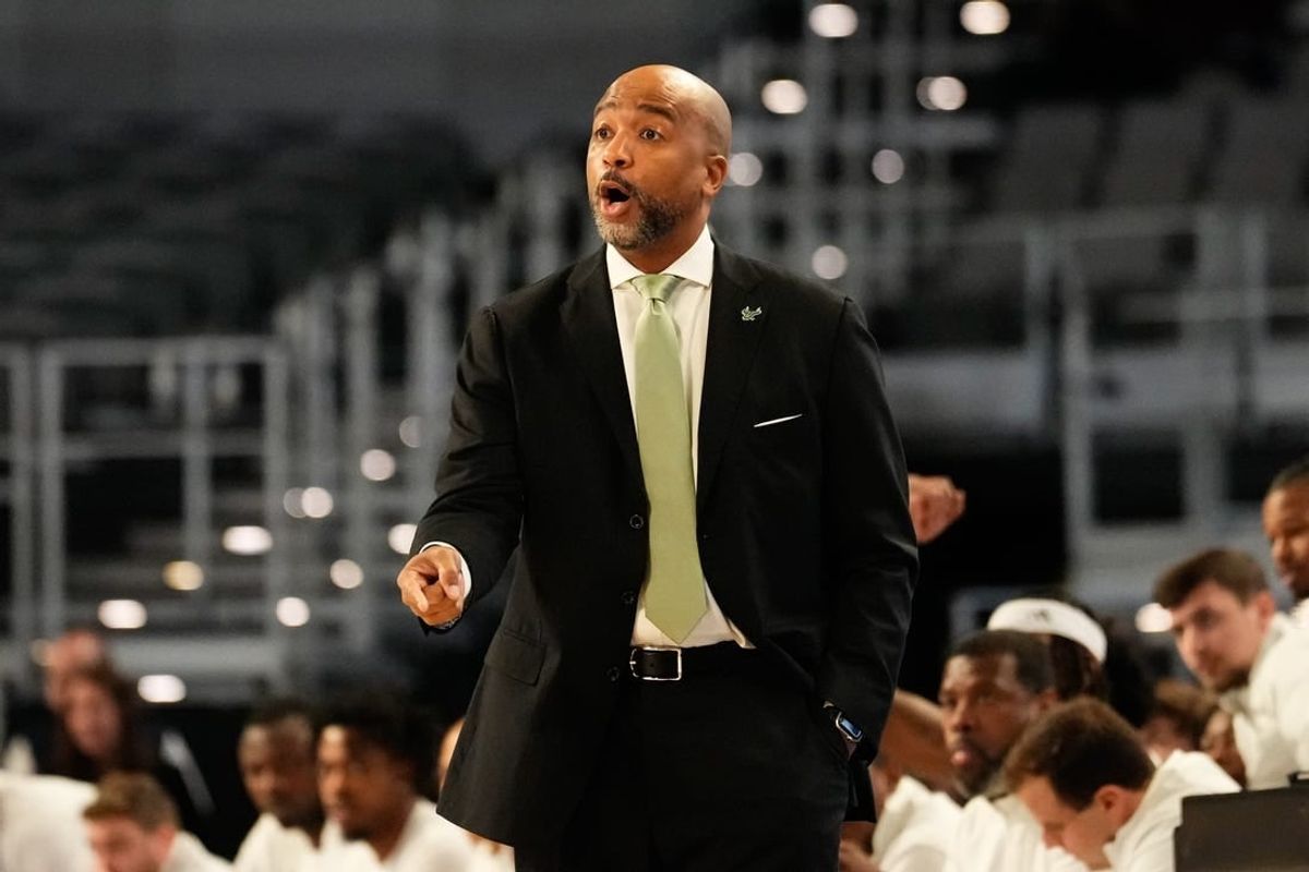 Mar 16, 2024; Fort Worth, TX, USA; South Florida Bulls head coach Amir Abdur-Rahim calls a play against the UAB Blazers during the first half at Dickies Arena.