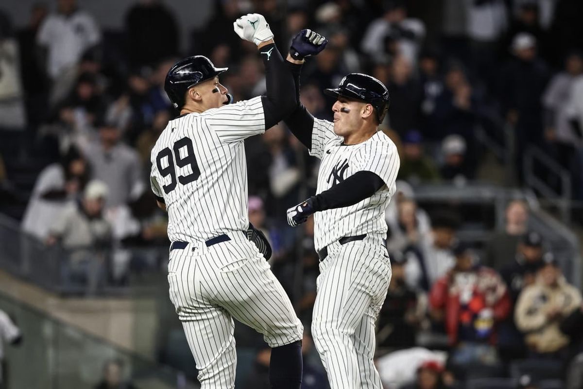 Apr 6, 2024; Bronx, New York, USA; New York Yankees first baseman Anthony Rizzo (48) celebrates with center fielder Aaron Judge (99) after hitting a two run home run in the fifth inning against the Toronto Blue Jays at Yankee Stadium.