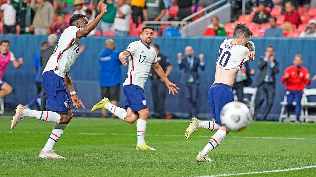 The USMNT celebrates after Christian Pulisic’ s penalty shot puts the U. S.  up 3-2 on El Tri.