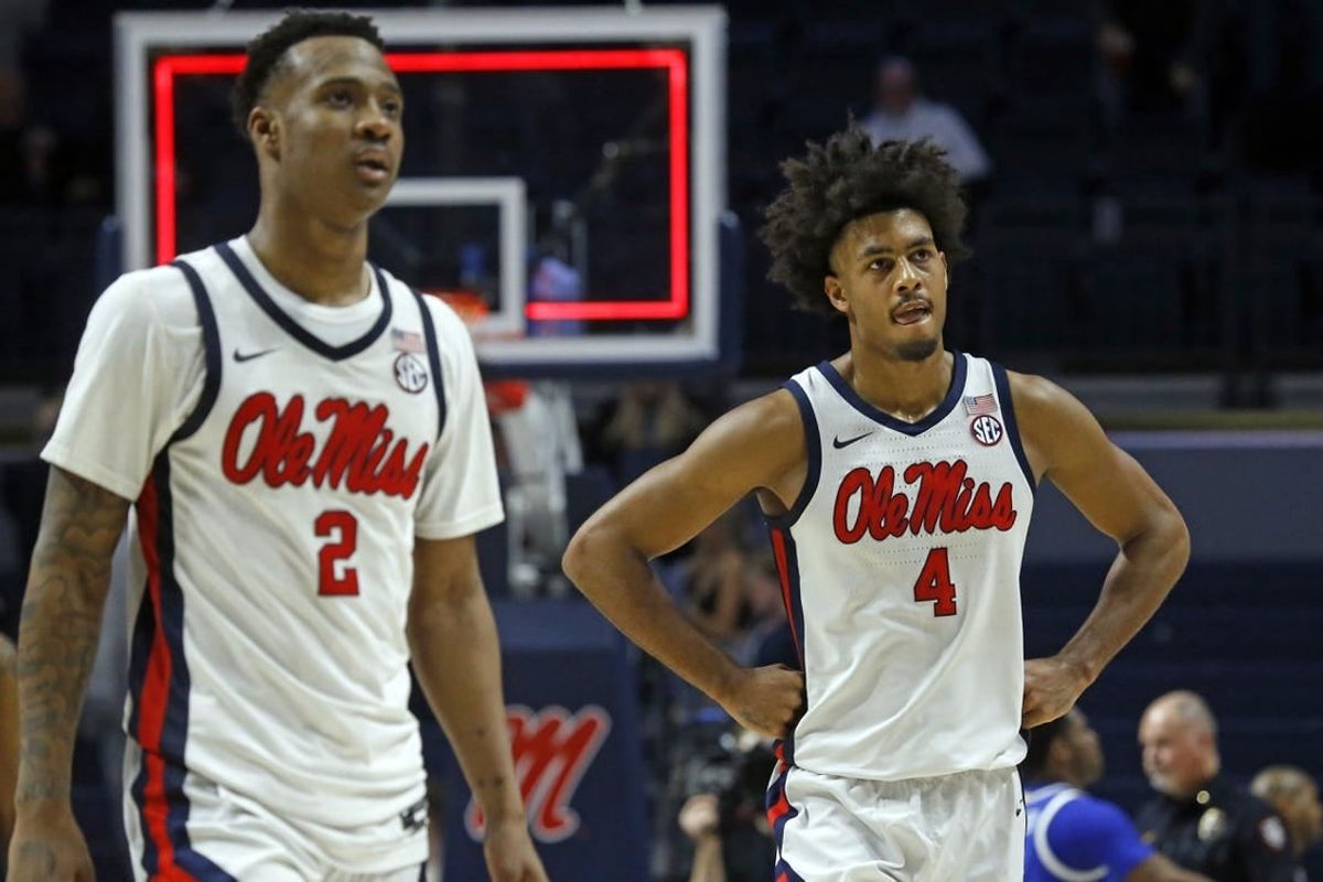Jan 31, 2023; Oxford, Mississippi, USA; Mississippi Rebels guard TJ Caldwell (2) and forward Jaemyn Brakefield (4) walk off the court after losing to the Kentucky Wildcats at The Sandy and John Black Pavilion at Ole Miss.