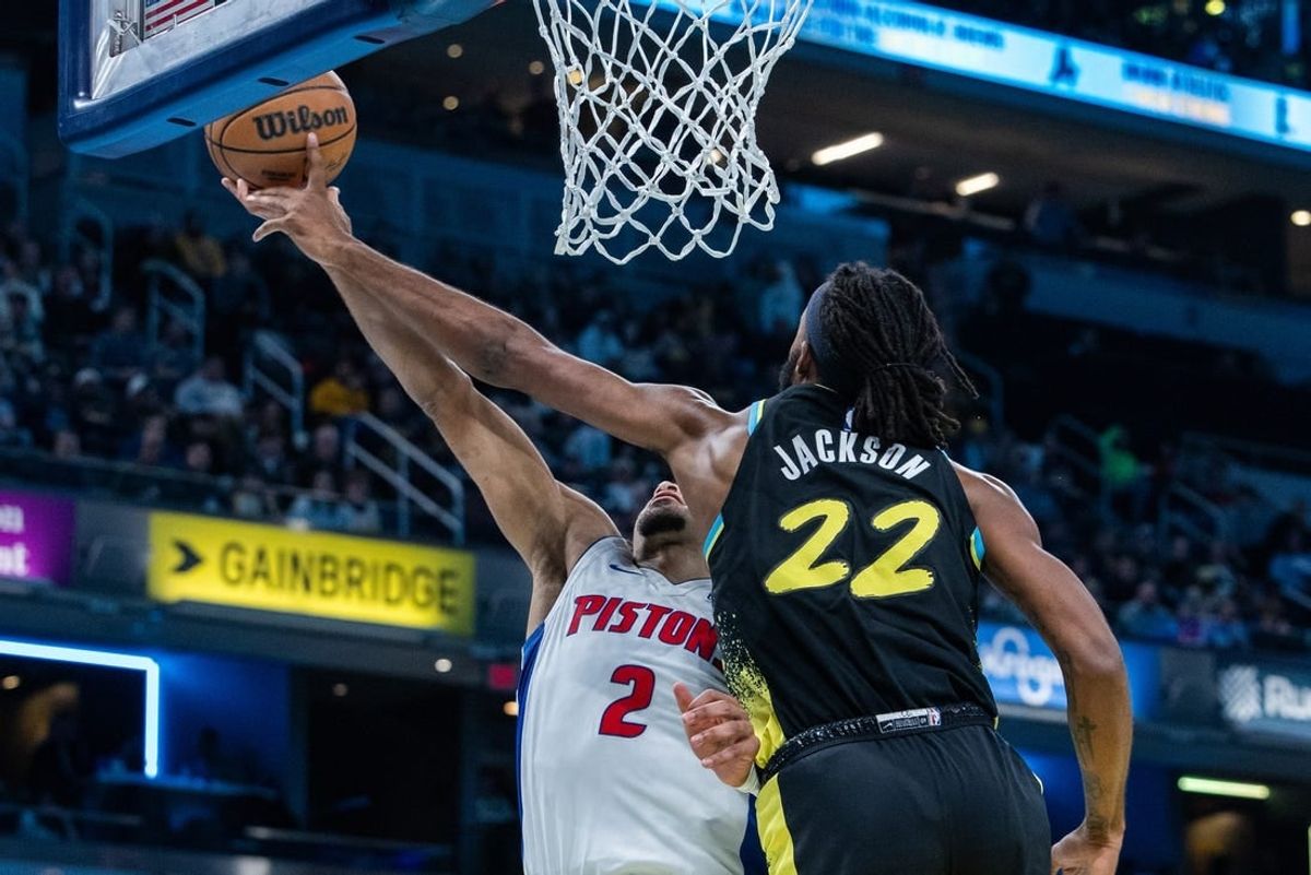 Nov 24, 2023; Indianapolis, Indiana, USA; Indiana Pacers forward Isaiah Jackson (22) blocks the shot of Detroit Pistons guard Cade Cunningham (2) in the first half at Gainbridge Fieldhouse.