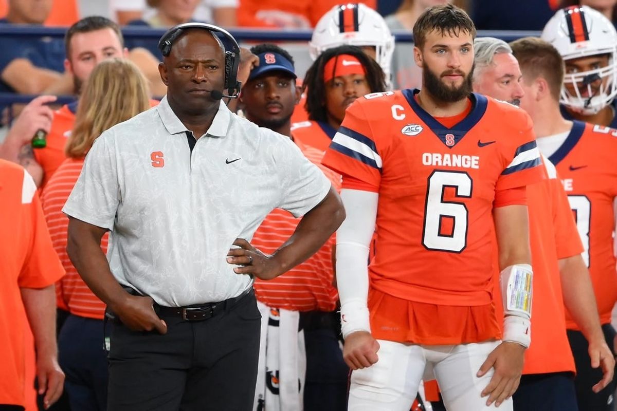 Sep 9, 2023; Syracuse, New York, USA; Syracuse Orange head coach Dino Babers (right) and quarterback Garrett Schrader (6) look on against the Western Michigan Broncos during the second half at the JMA Wireless Dome.