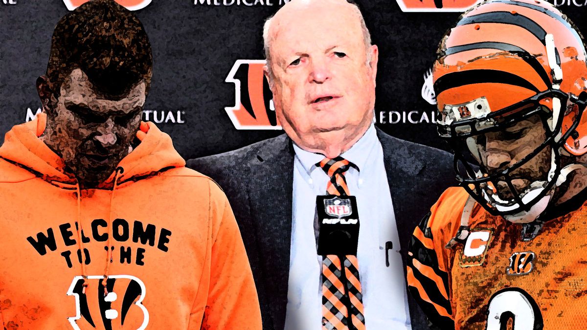 Bengals owner Mike Brown (c.) is to blame for the Carson Palmer (r.) era and Andy Dalton era.