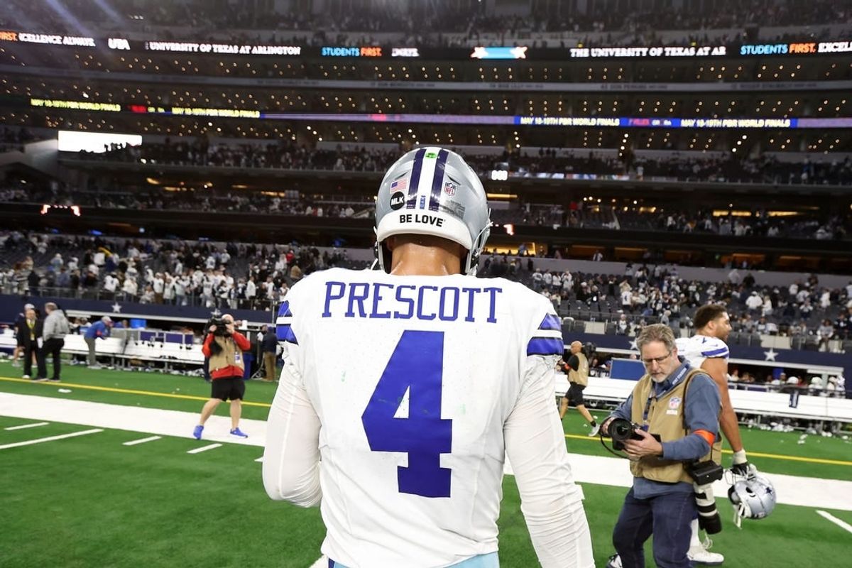Jan 14, 2024; Arlington, Texas, USA; Dallas Cowboys quarterback Dak Prescott (4) walks off the field after losing in the 2024 NFC wild card game against the Green Bay Packers at AT&T Stadium.