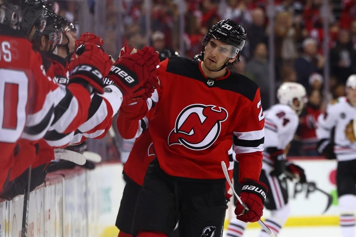 Jan 5, 2024; Newark, New Jersey, USA; New Jersey Devils center Michael McLeod (20) celebrates his goal against the Chicago Blackhawks during the third period at Prudential Center.