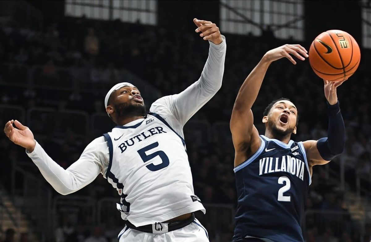 Jan 27, 2024; Indianapolis, Indiana, USA; Butler Bulldogs guard Posh Alexander (5) and Villanova Wildcats guard Mark Armstrong (2) battle for a rebound during the first half at Hinkle Fieldhouse.
