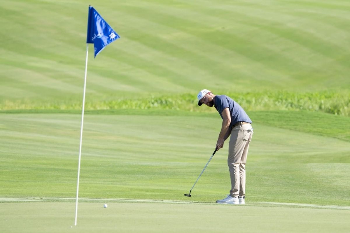 January 6, 2024; Maui, Hawaii, USA; Chris Kirk putts on the 18th hole during the third round of The Sentry golf tournament at Kapalua Golf - The Plantation Course.