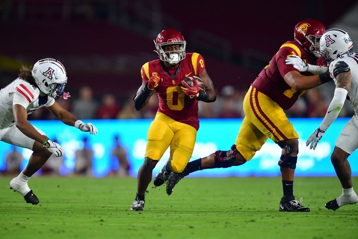 Oct 7, 2023; Los Angeles, California, USA; Southern California Trojans running back MarShawn Lloyd (0) runs the ball against the Arizona Wildcats during the first half at Los Angeles Memorial Coliseum.