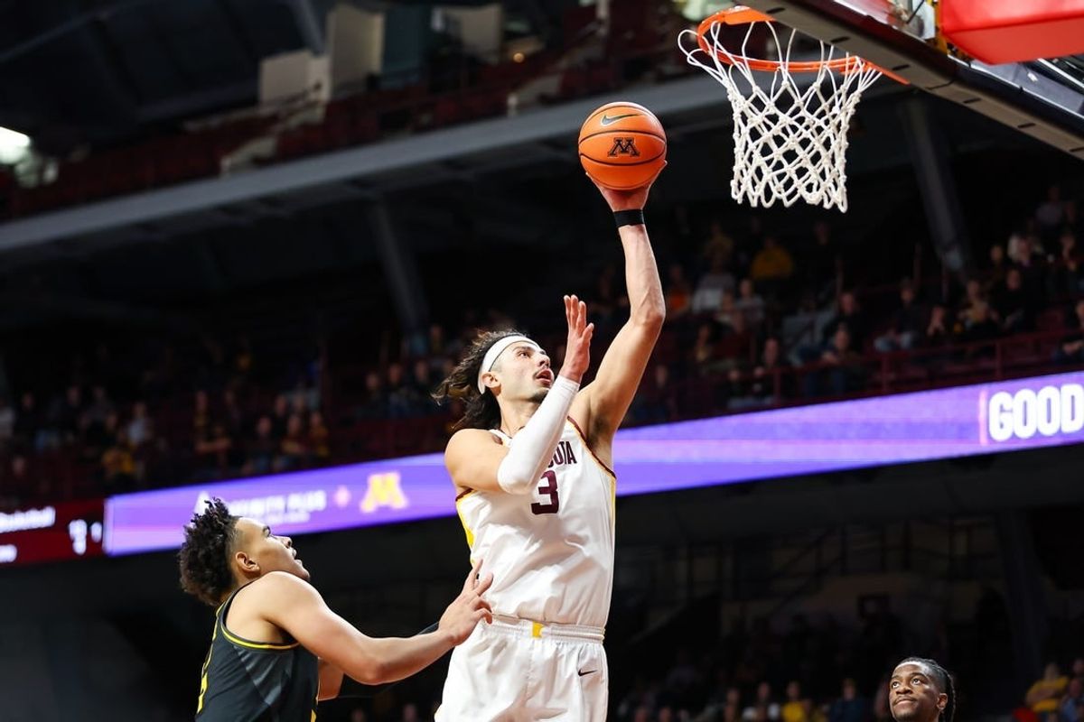 Nov 16, 2023; Minneapolis, Minnesota, USA; Minnesota Golden Gophers forward Dawson Garcia (3) shoots against the Missouri Tigers during the first half at Williams Arena.