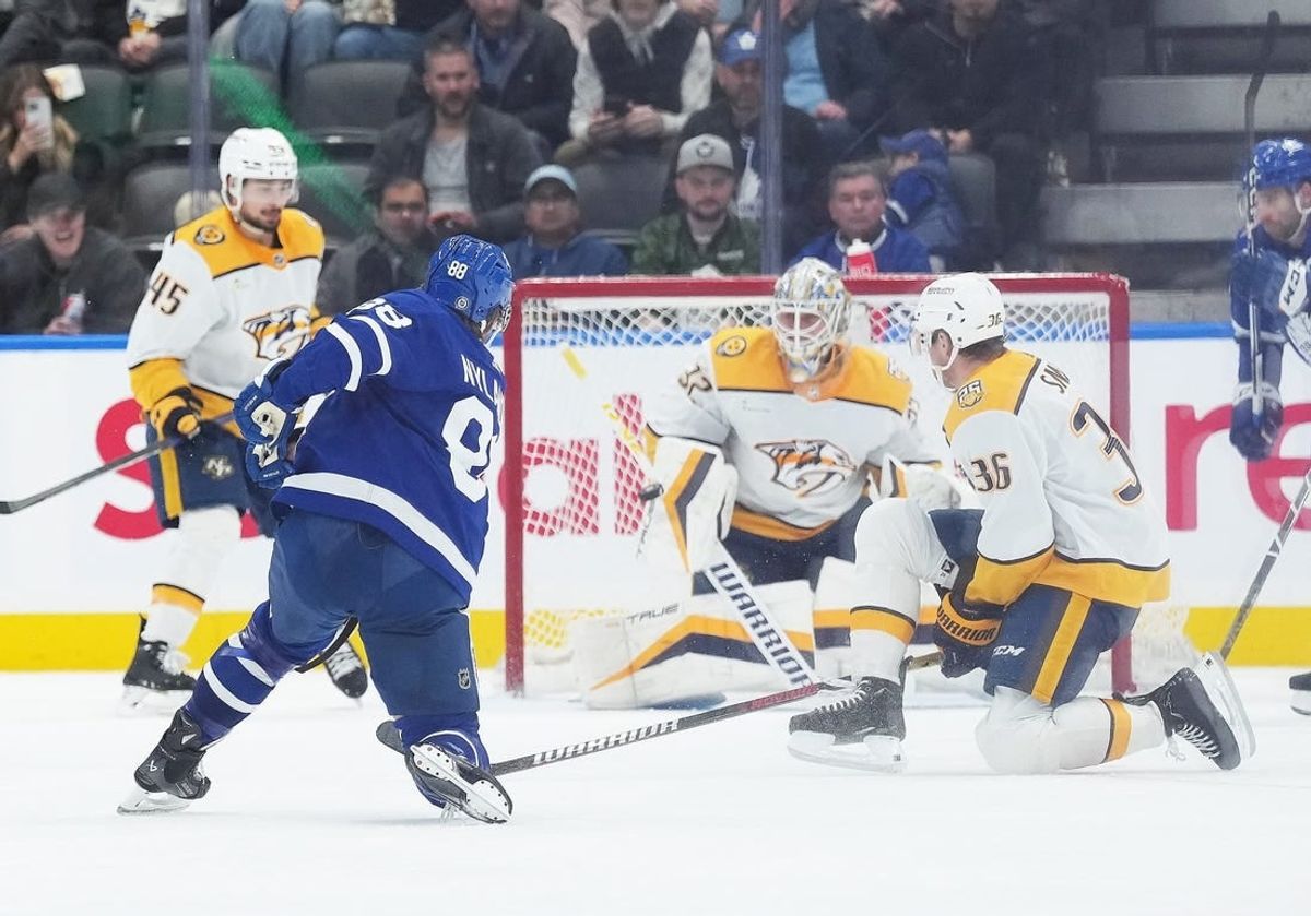 Dec 9, 2023; Toronto, Ontario, CAN; Toronto Maple Leafs right wing William Nylander (88) shoots the puck on Nashville Predators goaltender Kevin Lankinen (32) during the second period at Scotiabank Arena.
