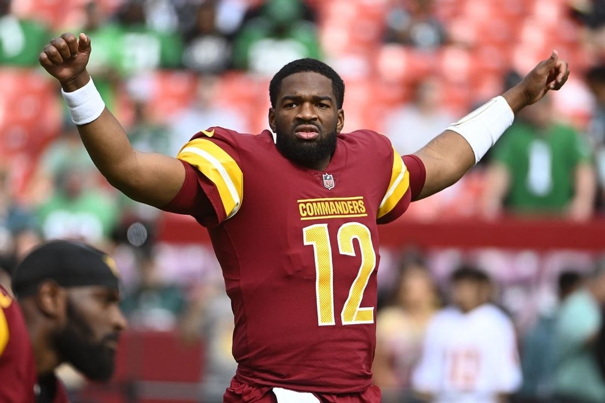 Oct 29, 2023; Landover, Maryland, USA; Washington Commanders quarterback Jacoby Brissett (12) on the field against the Philadelphia Eagles at FedExField.