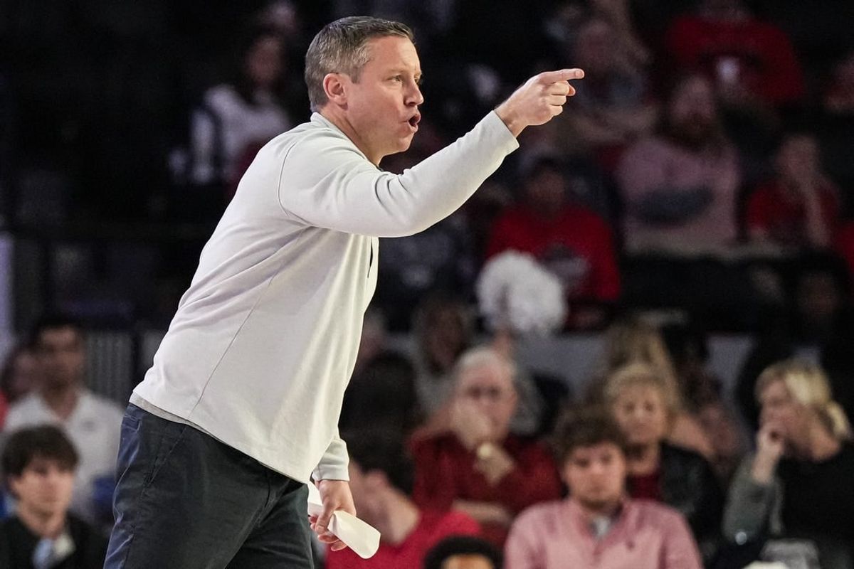 Dec 5, 2023; Athens, Georgia, USA; Georgia Bulldogs head coach Mike White reacts during the game against the Georgia Tech Yellow Jackets at Stegeman Coliseum.