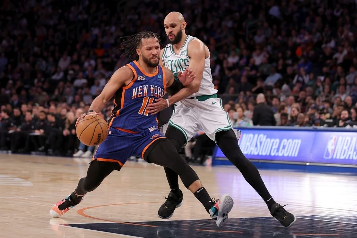 Feb 24, 2024; New York, New York, USA; New York Knicks guard Jalen Brunson (11) drives to the basket against Boston Celtics guard Derrick White (9) during the third quarter at Madison Square Garden.