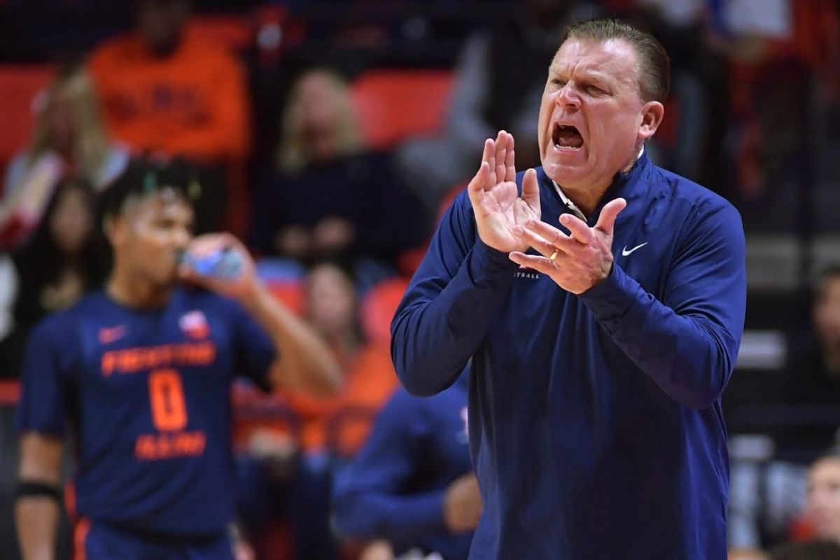 Nov 17, 2023; Champaign, Illinois, USA; Illinois Fighting Illini head coach Brad Underwood reacts off the bench during the second half against the Valparaiso Beacons at State Farm Center.