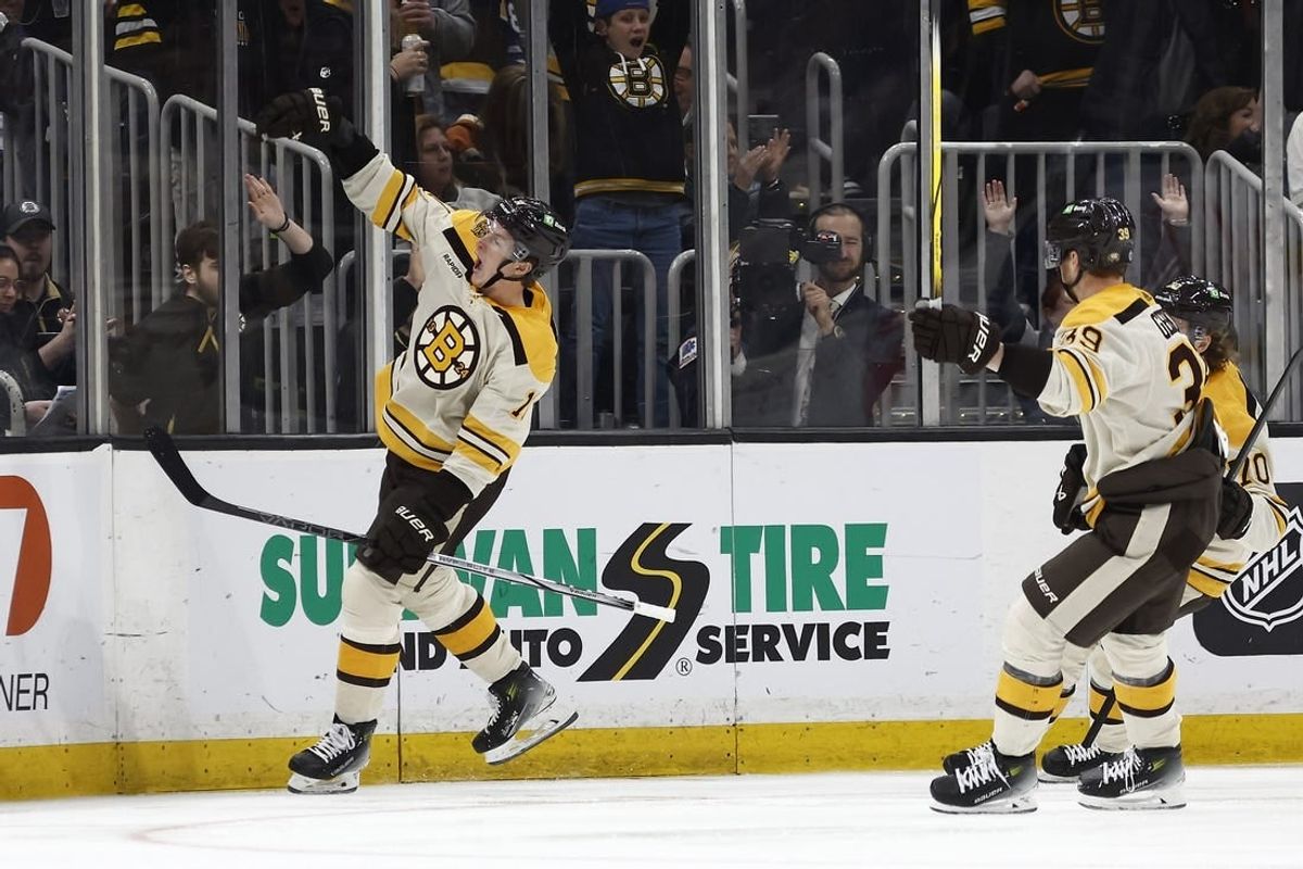 Mar 7, 2024; Boston, Massachusetts, USA; Boston Bruins center Trent Frederic (11) celebrates his goal against the Toronto Maple Leafs during the second period at TD Garden.