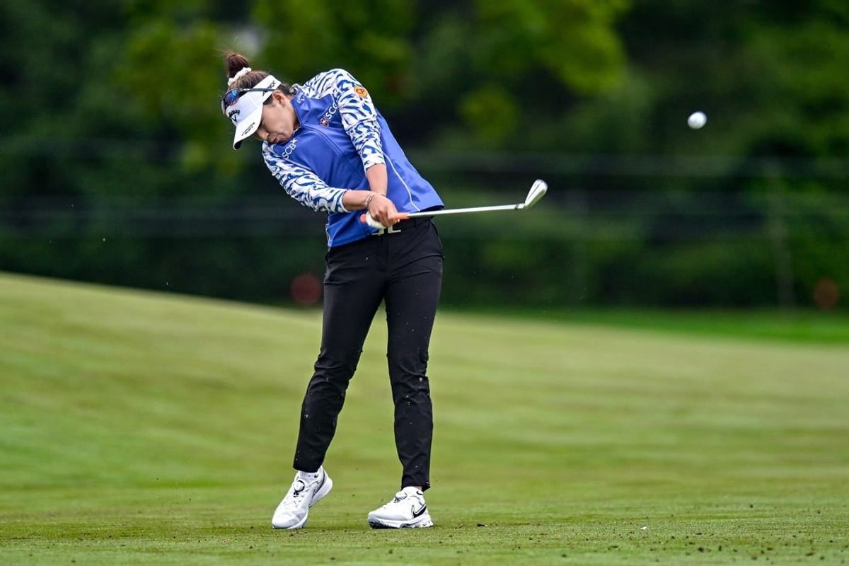 Jun 22, 2023; Springfield, New Jersey, USA; Atthaya Thitikul tees off on the 4th hole during the first round of the KPMG Women's PGA Championship golf tournament.