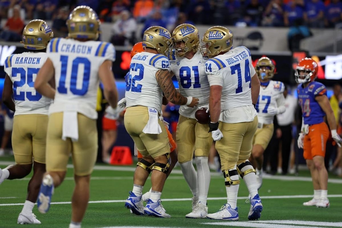 Dec 16, 2023; Inglewood, CA, USA; UCLA Bruins tight end Hudson Habermehl (81) celebrates with teammates after catching a touchdown pass in the first quarter against the Boise State Broncos during the LA Bowl at SoFi Stadium.