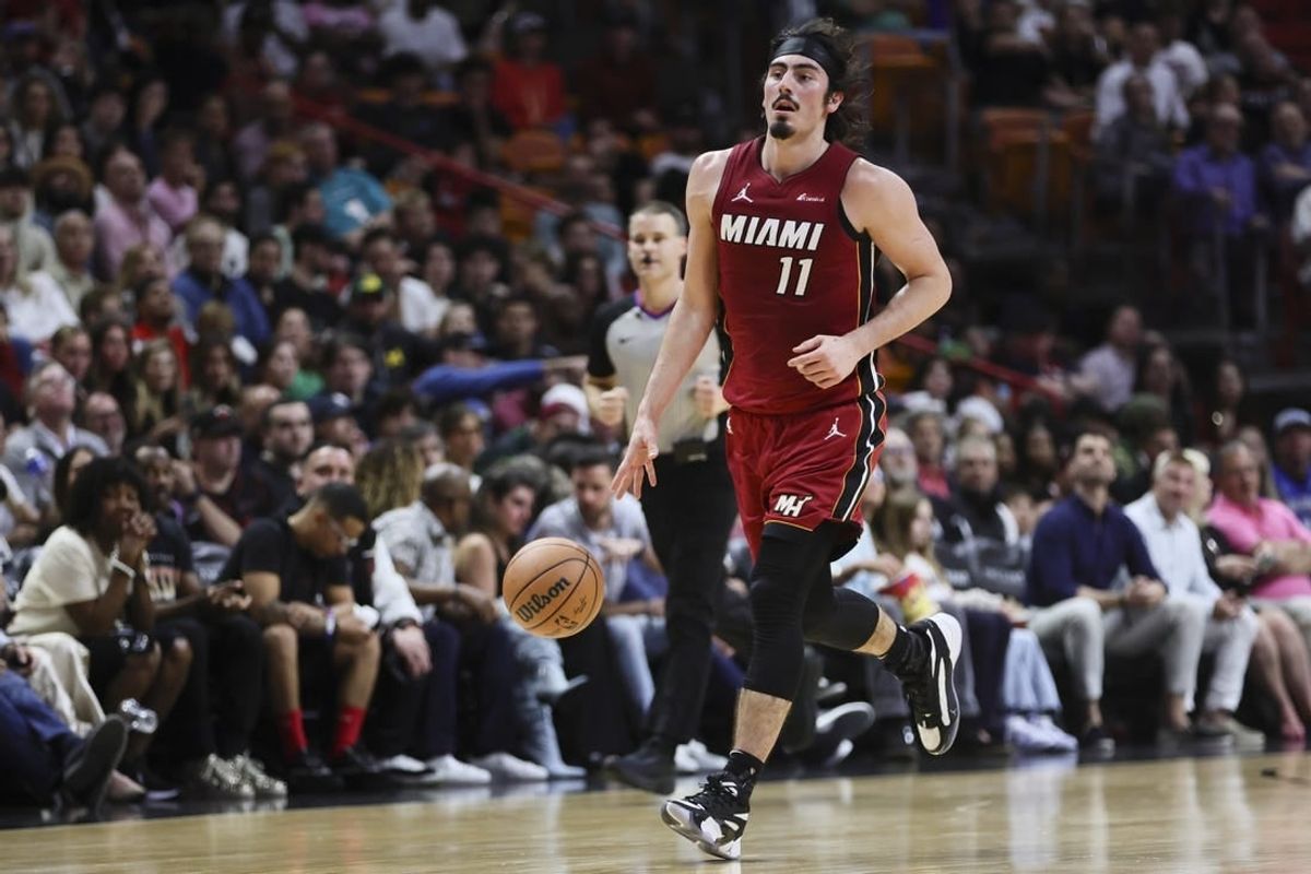 Jan 12, 2024; Miami, Florida, USA; Miami Heat guard Jaime Jaquez Jr. (11) dribbles the basketball against the Orlando Magic during the second quarter at Kaseya Center.