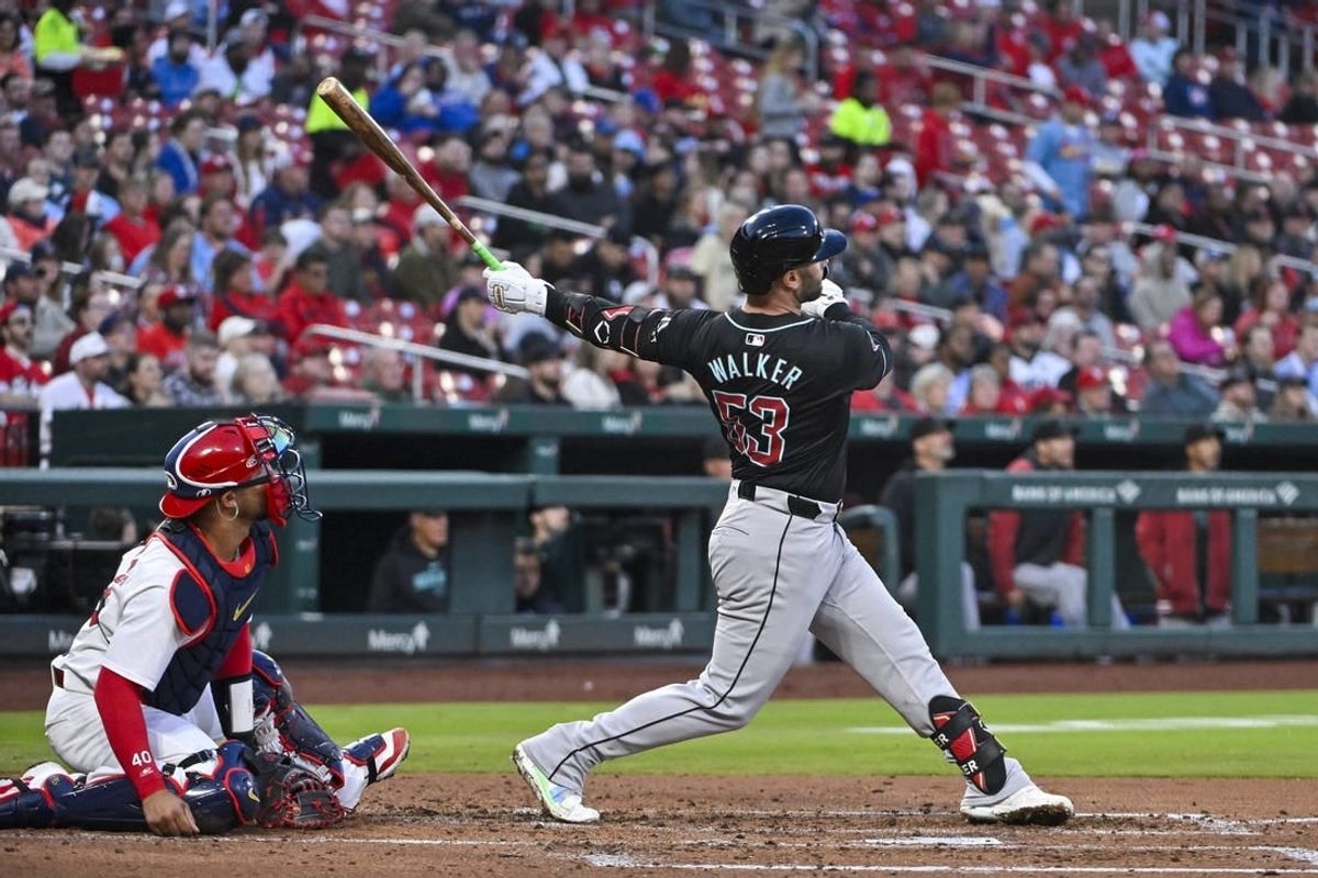 Apr 23, 2024; St. Louis, Missouri, USA;  Arizona Diamondbacks first baseman Christian Walker (53) hits a three run home run against the St. Louis Cardinals during the third inning at Busch Stadium.