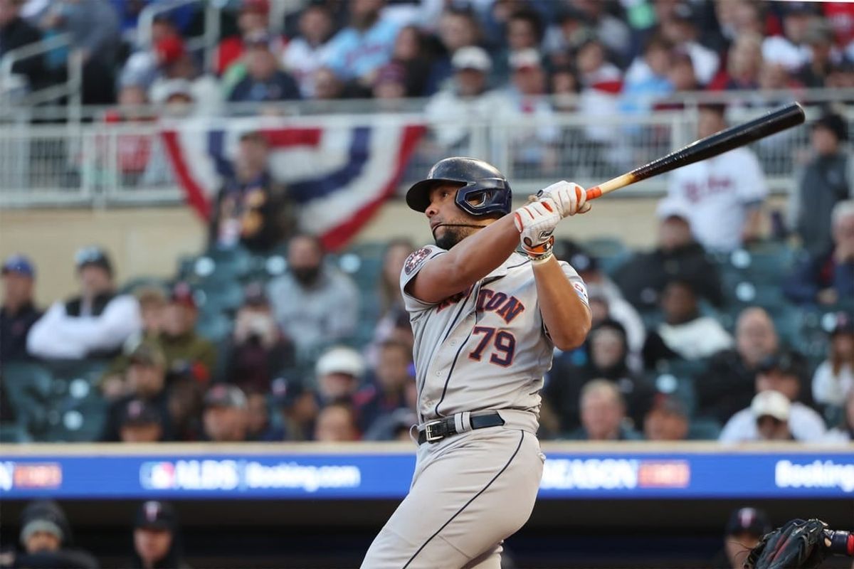 Oct 10, 2023; Minneapolis, Minnesota, USA; Houston Astros first baseman Jose Abreu (79) hits a two-run home-run in the ninth inning against the Minnesota Twins during game three of the ALDS for the 2023 MLB playoffs at Target Field.