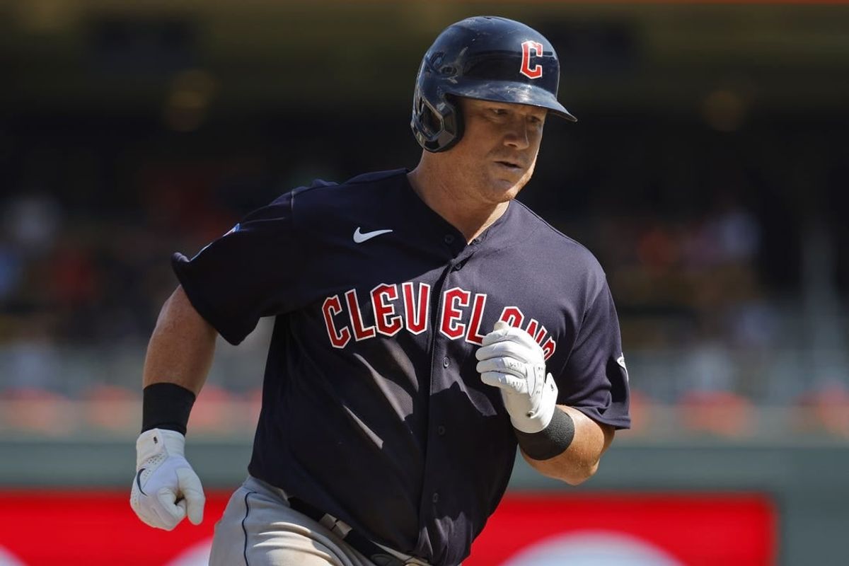 Aug 30, 2023; Minneapolis, Minnesota, USA; Cleveland Guardians first baseman Kole Calhoun (56) runs the bases on his three-run home run against the Minnesota Twins in the tenth inning at Target Field.