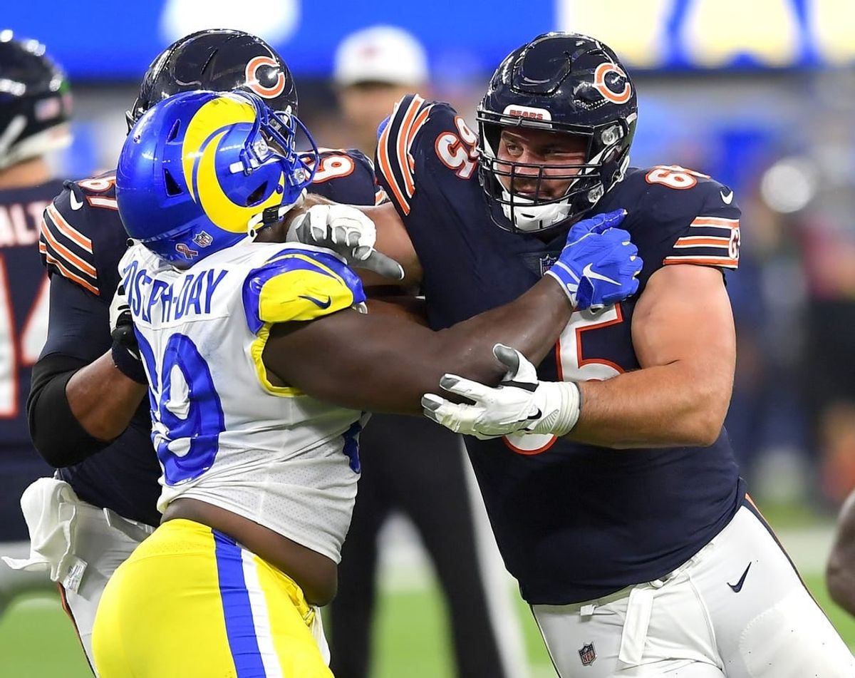 Sep 12, 2021; Inglewood, California, USA;   Los Angeles Rams defensive tackle Sebastian Joseph-Day (69) takes on Chicago Bears offensive lineman Sam Mustipher (67) and tight end Cole Kmet (85) in the second half of the game at SoFi Stadium.