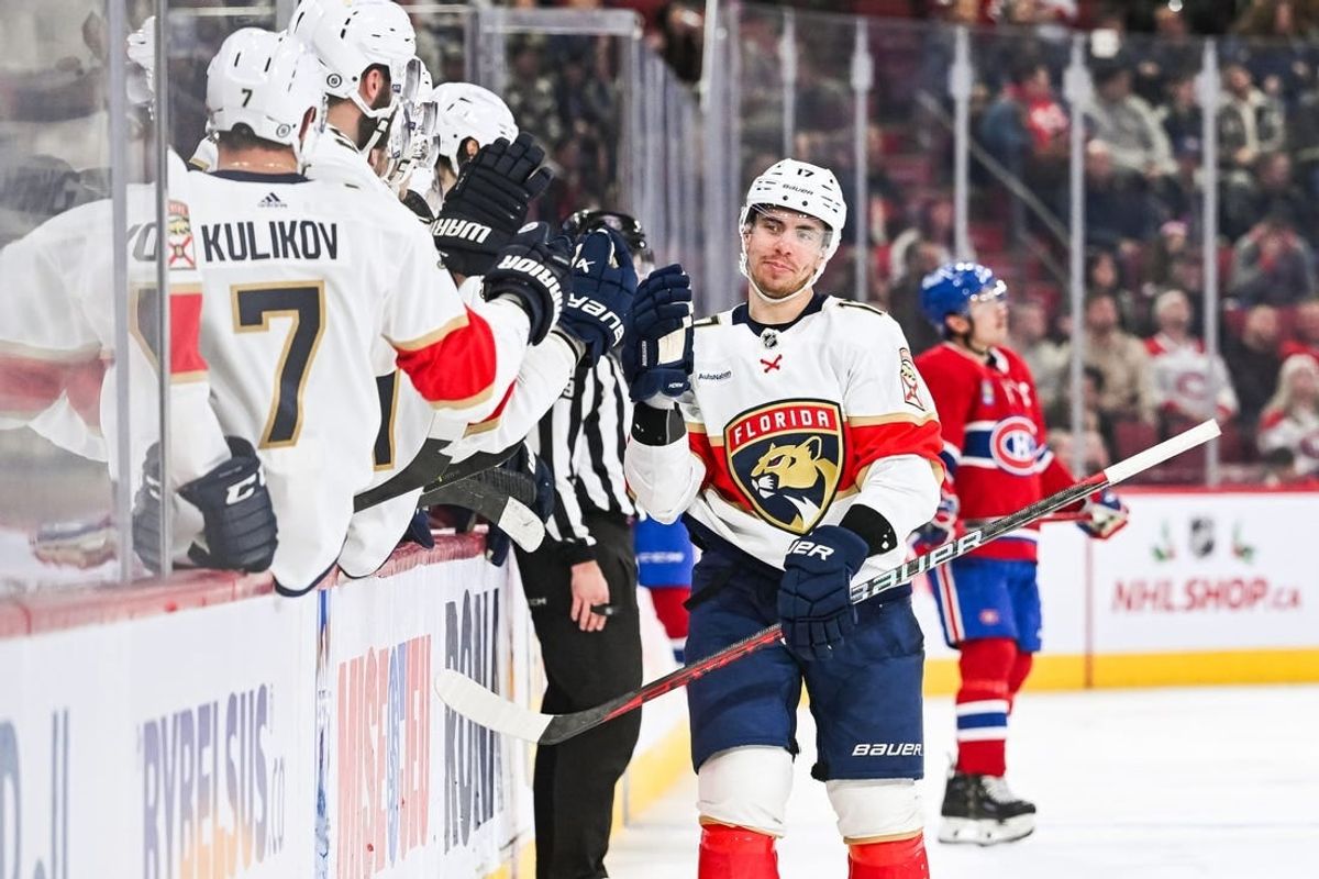 Nov 30, 2023; Montreal, Quebec, CAN; Florida Panthers center Evan Rodrigues (17) celebrates his goal against the Montreal Canadiens with his teammates at the bench during the third period at Bell Centre.