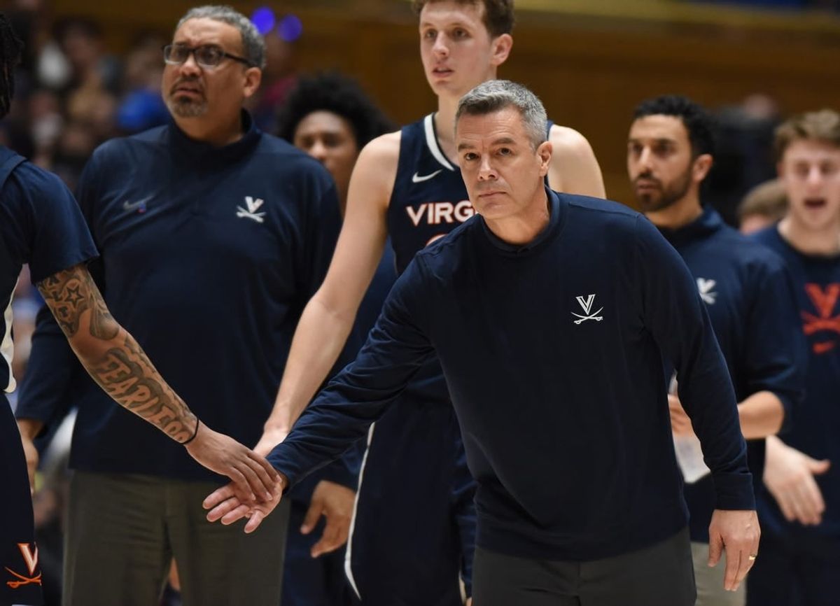 Mar 2, 2024; Durham, North Carolina, USA; Virginia Cavaliers head coach Tony Bennett greets players during a timeout in  the first half  against the Duke Blue Devils at Cameron Indoor Stadium.