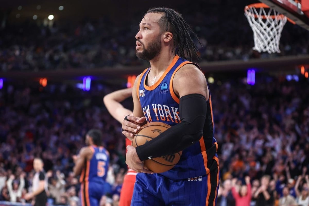 Apr 14, 2024; New York, New York, USA;  New York Knicks guard Jalen Brunson (11) holds onto the ball after grabbing a rebound in overtime against the Chicago Bulls at Madison Square Garden.
