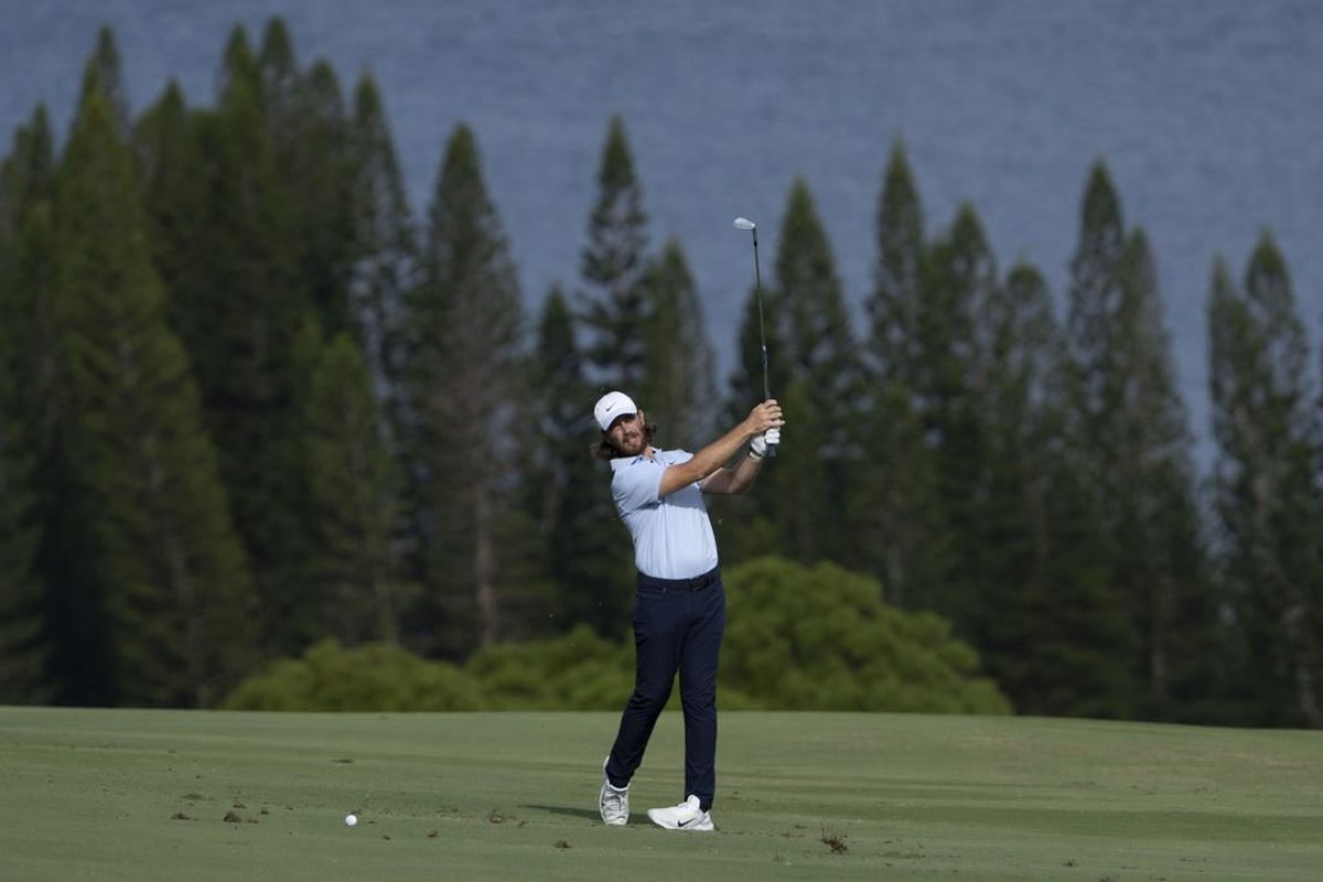 January 4, 2024; Maui, Hawaii, USA; Tommy Fleetwood hits his fairway shot on the fourth hole during the first round of The Sentry Tournament of Champions golf tournament at Kapalua Golf - The Plantation Course.