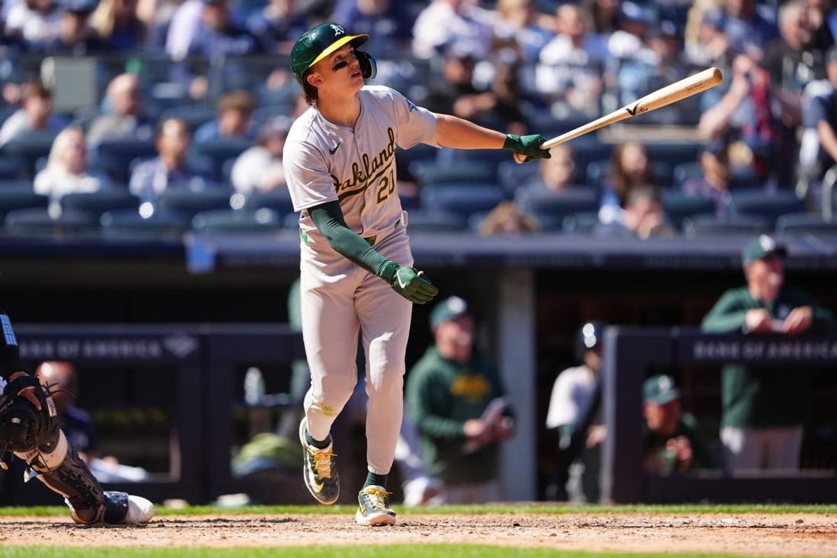 Apr 22, 2024; Bronx, New York, USA; Oakland Athletics second baseman Zack Gelof (20) reacts after hitting a run home run against the New York Yankees during the ninth inning at Yankee Stadium.