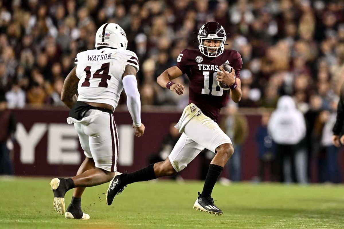 Nov 11, 2023; College Station, Texas, USA; Texas A&M Aggies quarterback Jaylen Henderson (16) run the ball during the second quarter against the Mississippi State Bulldogs at Kyle Field.