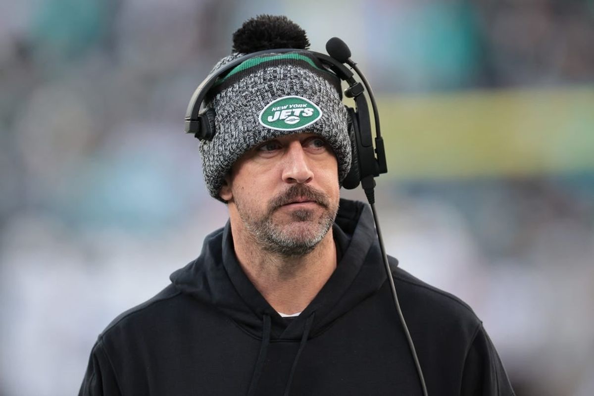 Nov 24, 2023; East Rutherford, New Jersey, USA; New York Jets quarterback Aaron Rodgers (8) on the sidelines during the first half against the Miami Dolphins at MetLife Stadium.