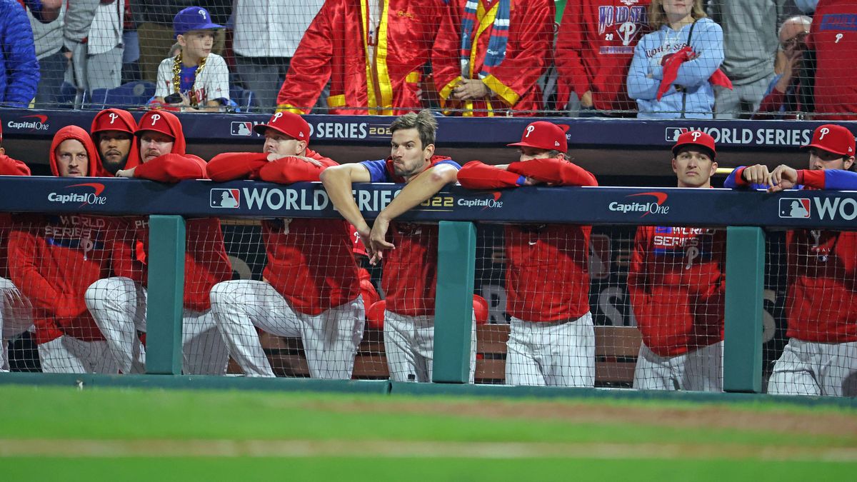 The Philadelphia Phillies dugout watches on during the 9th inning of World Series Game 4