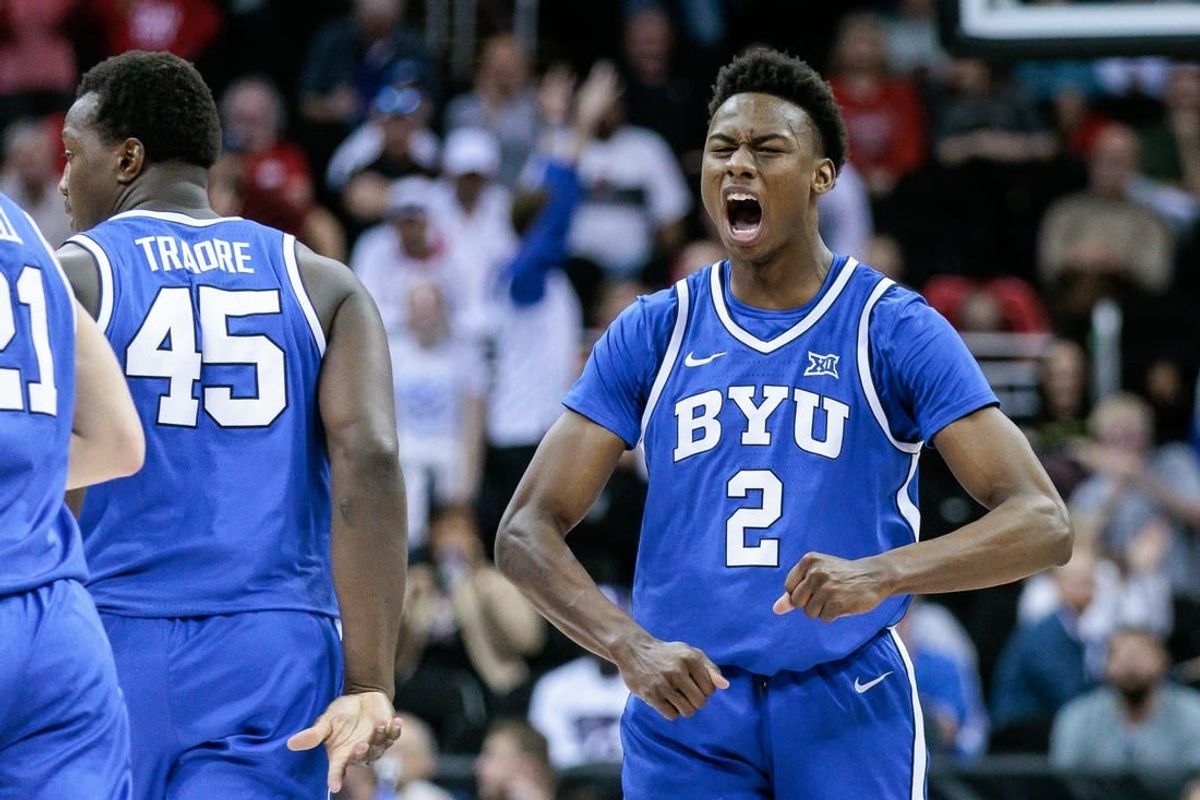 Mar 14, 2024; Kansas City, MO, USA; Brigham Young Cougars guard Jaxson Robinson (2) reacts to a play during the second half against the Texas Tech Red Raiders at T-Mobile Center.
