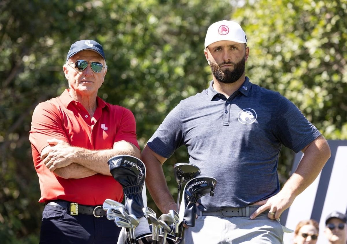 Feb 2, 2024; Playa del Carmen, Quintana Roo, MEX; Jon Rahm of Team Legion XIII, right, stands with LIV CEO Greg Norman on the first tee during the fist round of the LIV Golf Mayakoba tournament at El Chamaleon Golf Course.