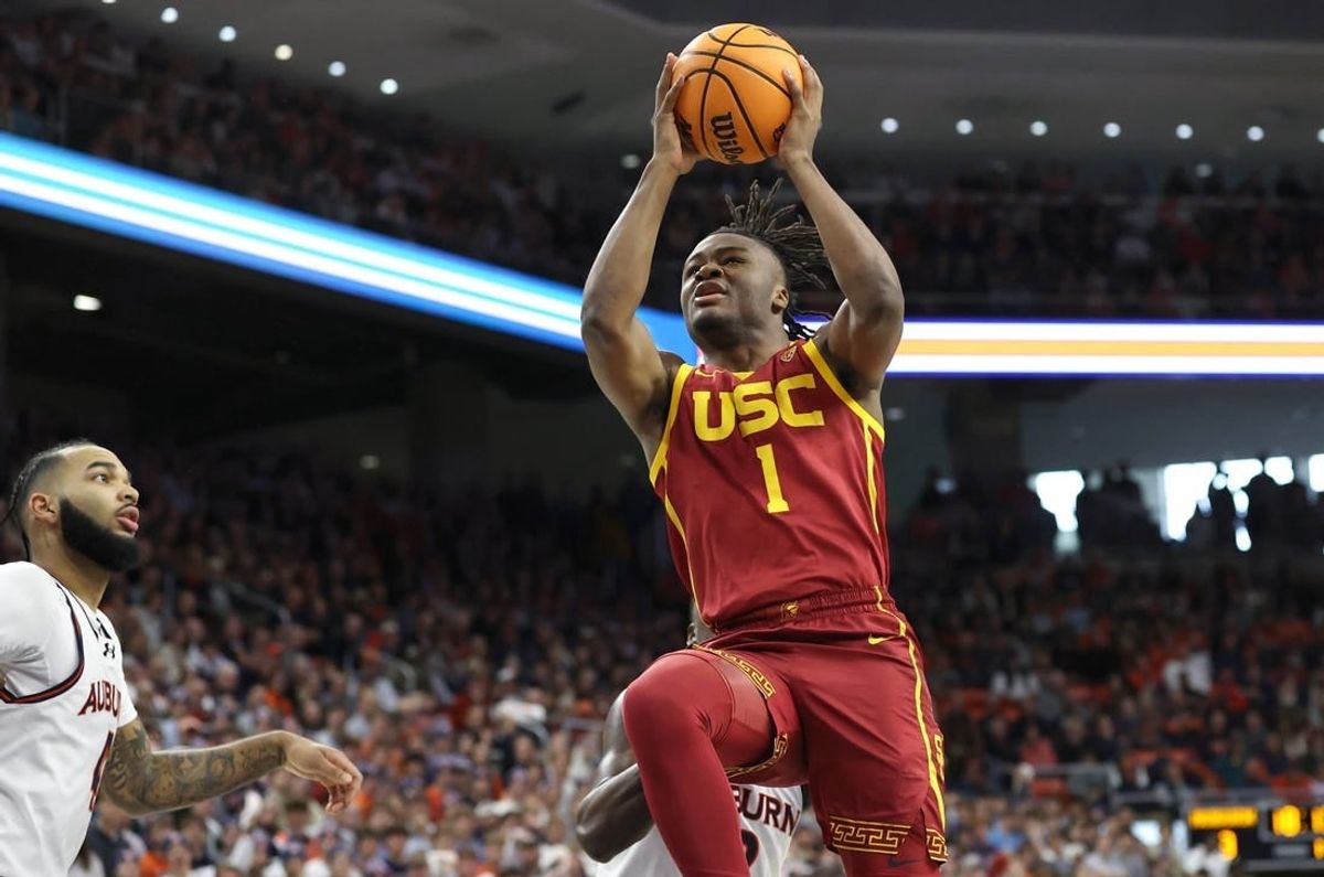Dec 17, 2023; Auburn, Alabama, USA;  USC Trojans guard Isaiah Collier (1) shoots a layup against the Auburn Tigers during the first half at Neville Arena.