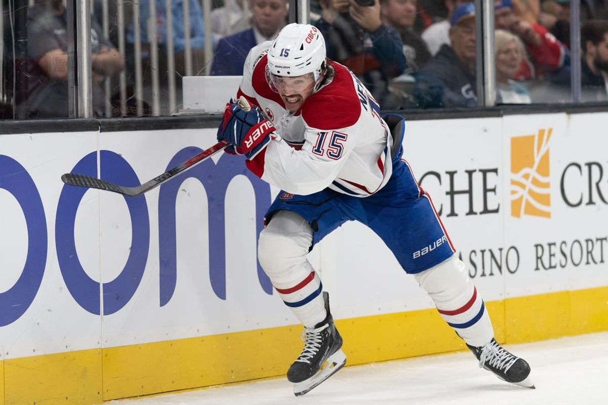 Nov 24, 2023; San Jose, California, USA; Montreal Canadiens center Alex Newhook (15) chases after the puck during the third period against the San Jose Sharks at SAP Center at San Jose.