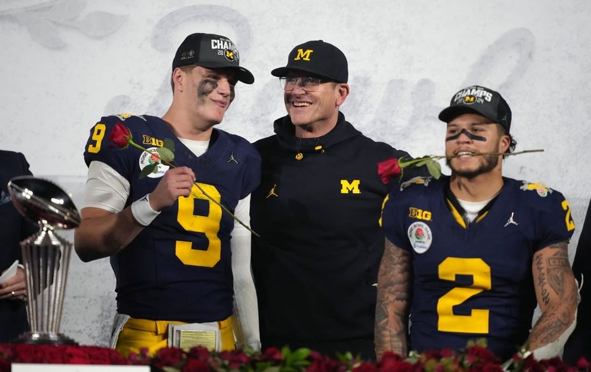 Jan 1, 2024; Pasadena, CA, USA; Michigan Wolverines head coach Jim Harbaugh (center) celebrates with quarterback J.J. McCarthy (9) and running back Blake Corum (2) after defeating the Alabama Crimson Tide in the 2024 Rose Bowl college football playoff semifinal game at Rose Bowl.