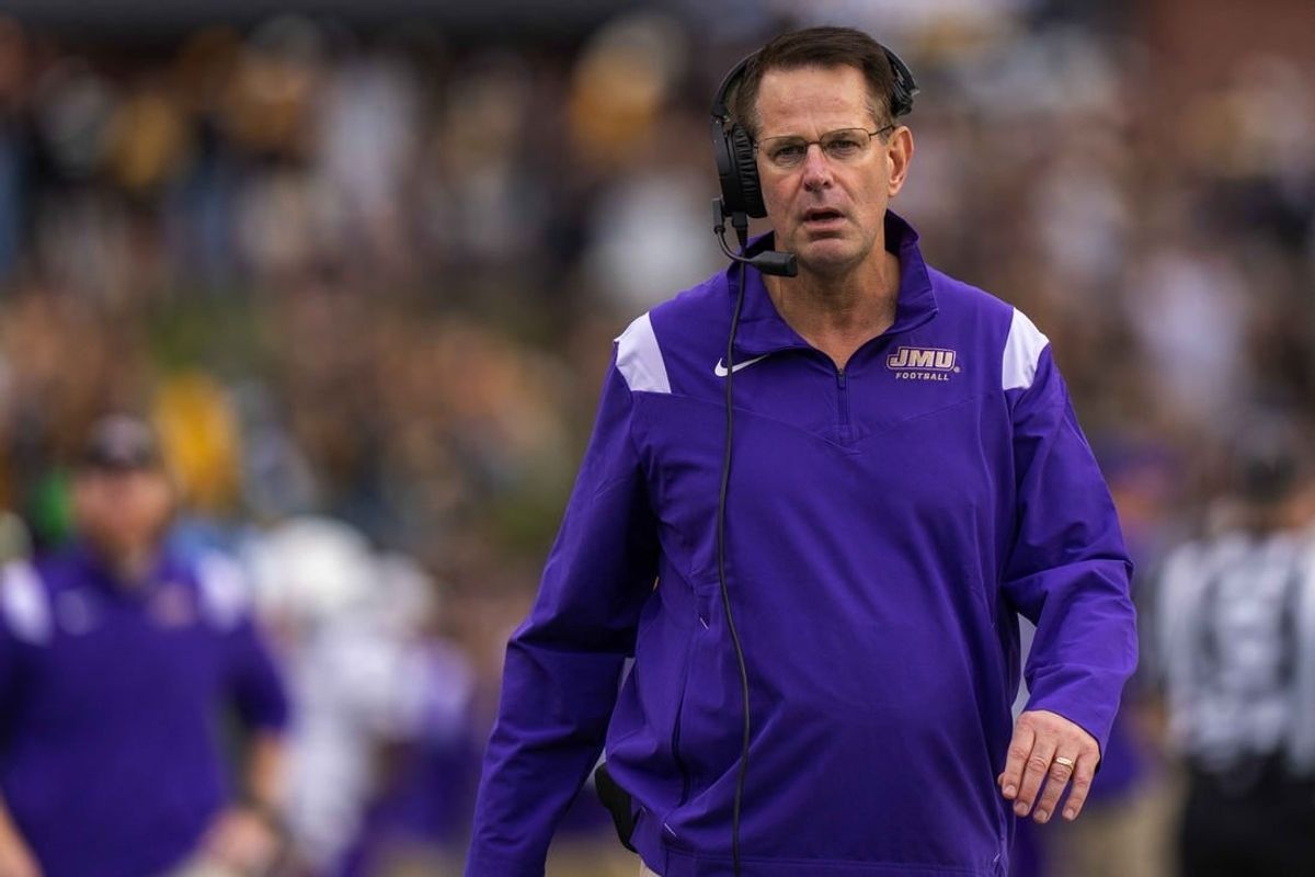 Sep 24, 2022; Boone, North Carolina, USA; James Madison Dukes head coach Curt Cignetti walks the sideline during a game against the Appalachian State Mountaineers at Kidd Brewer Stadium.