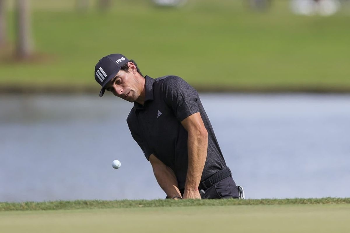 Oct 22, 2023; Doral, Florida, USA; Joaquin Niemann plays his shot on the seventh hole during the final round of the LIV Golf Miami golf tournament at Trump National Doral.