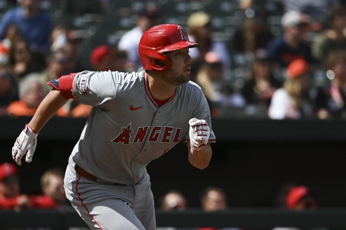 Mar 31, 2024; Baltimore, Maryland, USA;  Los Angeles Angels first baseman Nolan Schanuel (18) runs out a first inning single against the Baltimore Orioles at Oriole Park at Camden Yards.