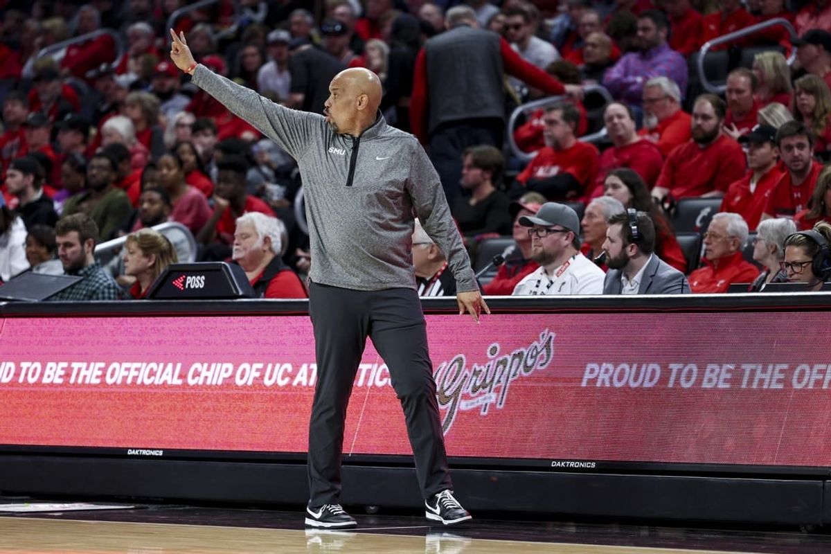 Mar 5, 2023; Cincinnati, Ohio, USA;  Southern Methodist Mustangs head coach Rob Lanier works the sideline in the game against the Cincinnati Bearcats in the first half at Fifth Third Arena.