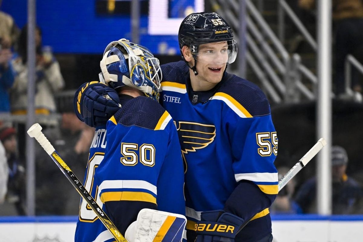 Nov 14, 2023; St. Louis, Missouri, USA;  St. Louis Blues goaltender Jordan Binnington (50) and defenseman Colton Parayko (55) celebrate after the Blues defeated the Tampa Bay Lightning at Enterprise Center.