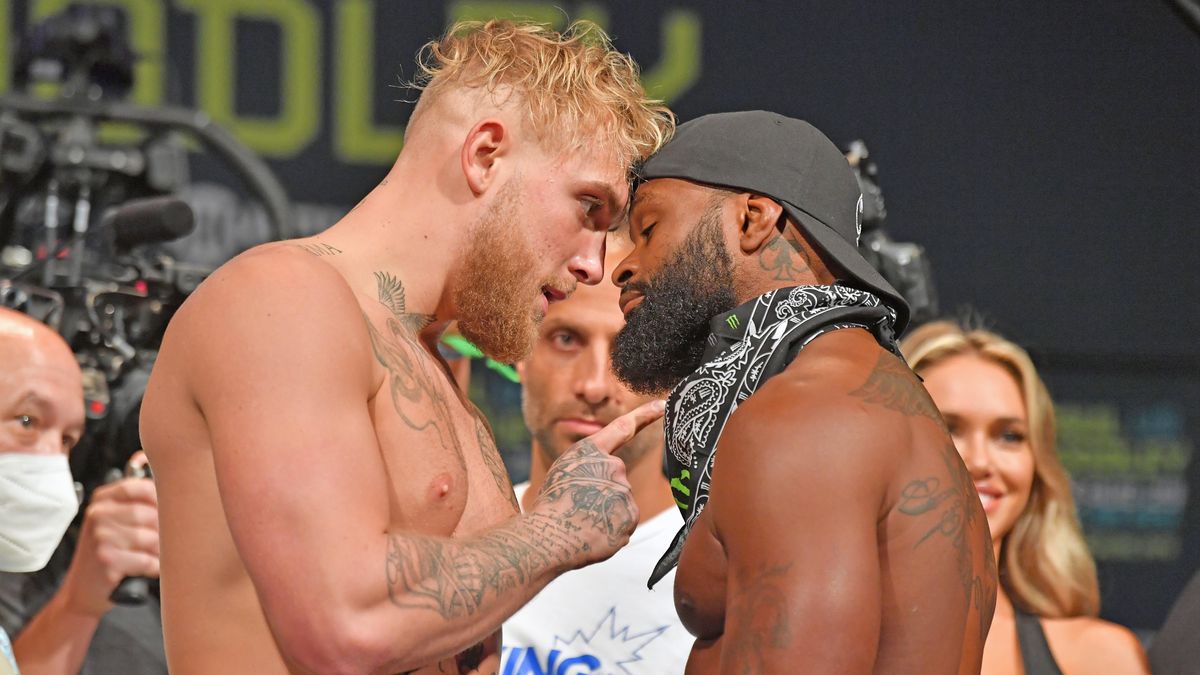 Jake Paul and Tyron Woodley face off during the weigh-in  event at the State Theater prior to their August 29 fight on August 28, 2021,  in Cleveland, Ohio.