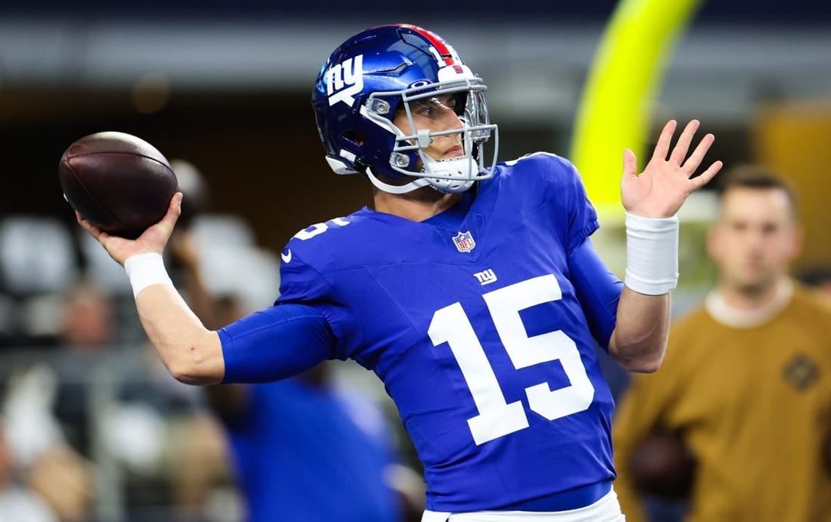Nov 12, 2023; Arlington, Texas, USA;  New York Giants quarterback Tommy DeVito (15) warms up before the game against the Dallas Cowboys at AT&T Stadium.