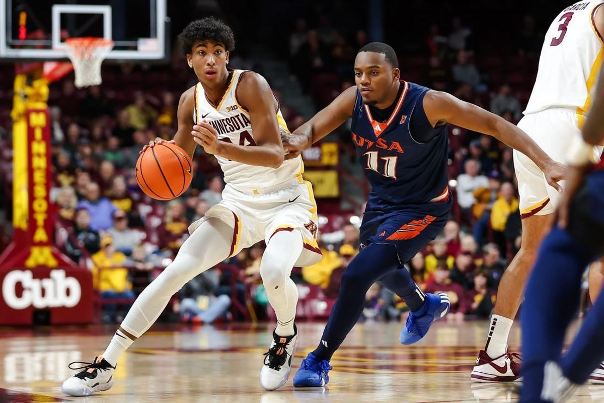 Nov 10, 2023; Minneapolis, Minnesota, USA; Minnesota Golden Gophers guard Cam Christie (24) works around Texas-San Antonio Roadrunners guard Isaiah Wyatt (11) during the first half at Williams Arena.