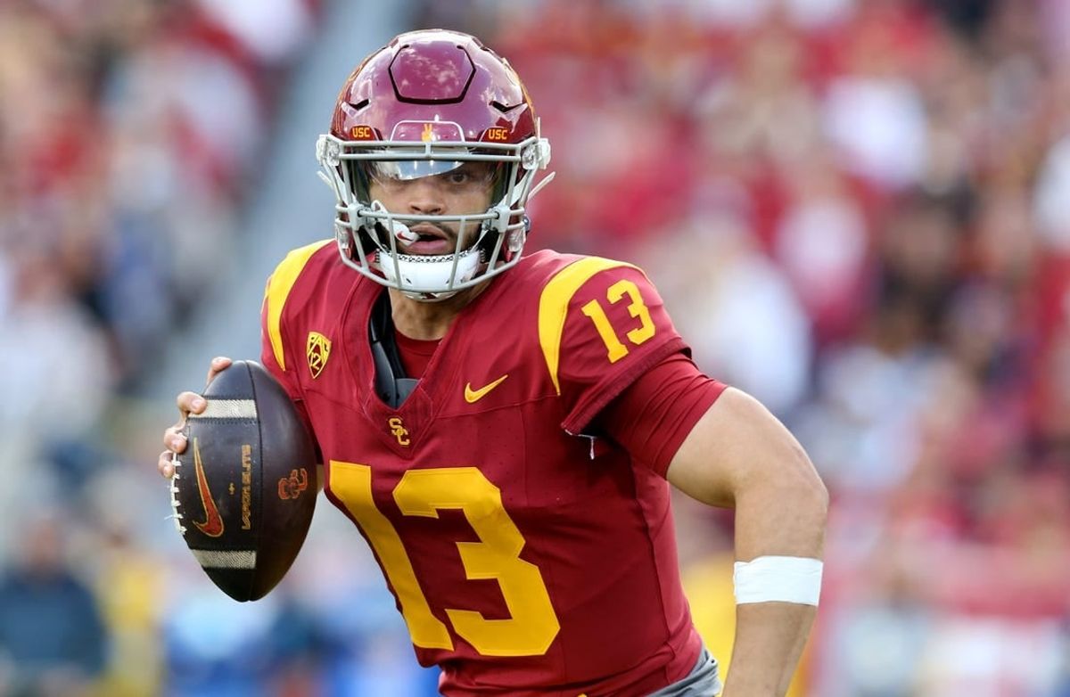 Nov 18, 2023; Los Angeles, California, USA; USC Trojans quarterback Caleb Williams (13) scrambles during the second quarter against the UCLA Bruins at United Airlines Field at Los Angeles Memorial Coliseum.